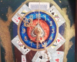 I made this clock about 5 years ago. Acrylics, playing cards, and clock kit